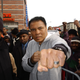 Boxing legend Muhammad Ali greets a crowd in Harlem on Feb. 5, 2003.
Ezra Shaw/Getty Images